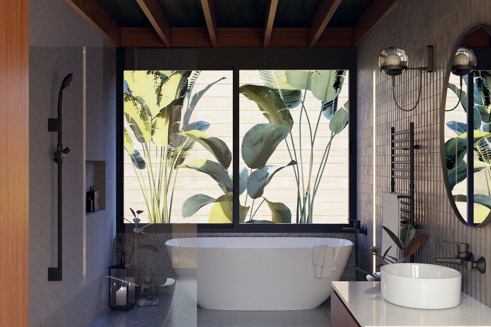 Bathroom with a frameless shower screen
