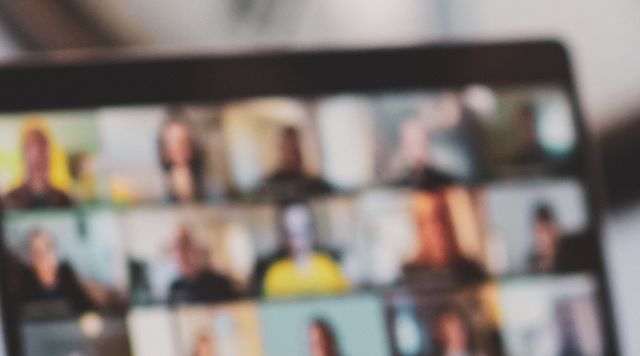 Laptop with an online meeting on the screen