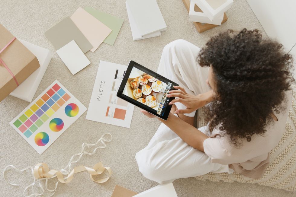 Woman choosing a photograph filter for her online business
